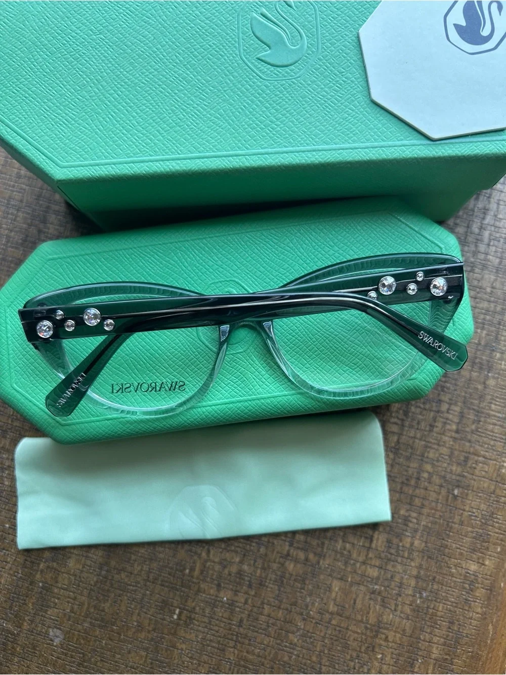 New in box Swarovski glasses